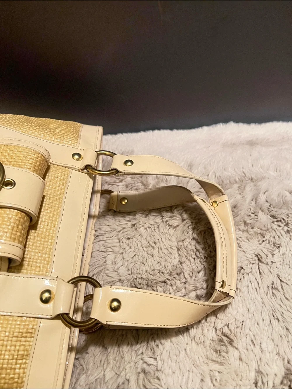 Coach white leather and straw tote.